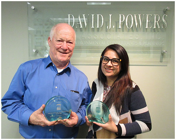 Photo of Pooja Nagrath and John Hesler with their AEP awards for the Silicon Valley Clean Water Wastewater Conveyance System and Treatment Plant Reliability Improvement Project EIR and the Environmental Analysis Merit Award for the Modification to San Jose Municipal Code for Airport Signage Categorical Exemption.