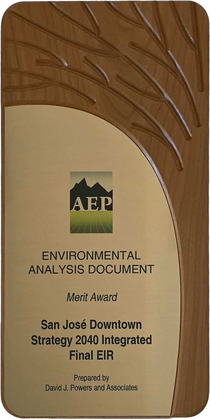 Photo of Pooja Nagrath and John Hesler with their AEP awards for the Silicon Valley Clean Water Wastewater Conveyance System and Treatment Plant Reliability Improvement Project EIR and the Environmental Analysis Merit Award for the Modification to San Jose Municipal Code for Airport Signage Categorical Exemption.